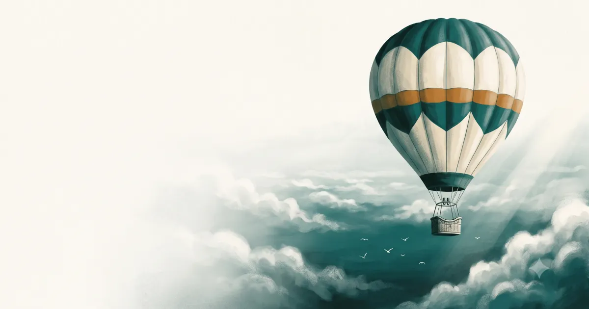 Montgolfière survolant une mer de nuages